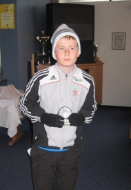 Kjartan Atli Ísleifsson með viðurkenningu sína